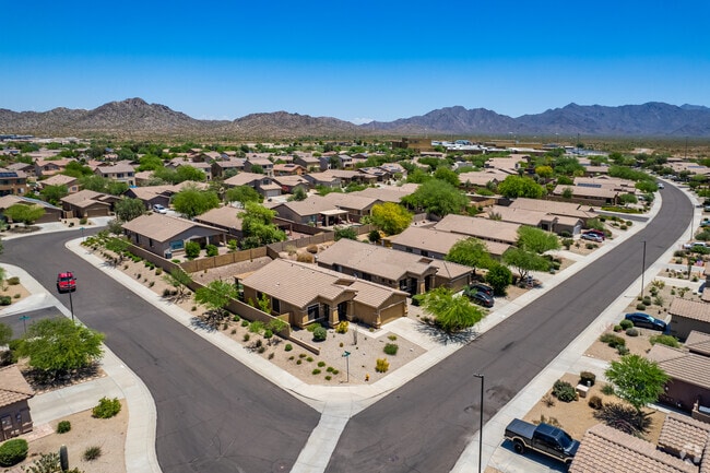 Arizona desert homes in Estrella Mountain frame the Sierra Estrella horizon.