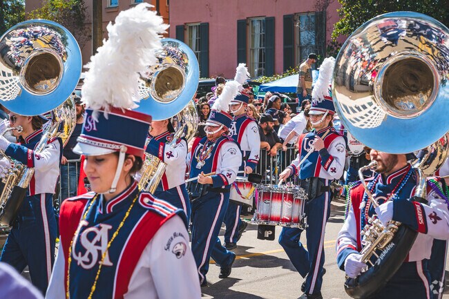 The University of South Alabama Marching Band performs at a few spots near Westhill.