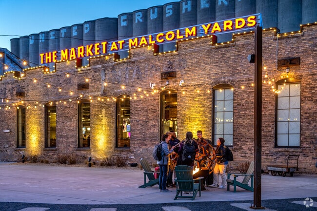 Colder months in Prospect Park, warm up next to the fire at the Market at Malcolm Yards.
