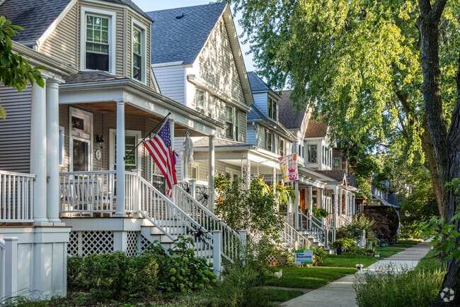 Home owners in Saint Ben's decorate their front porches with flags and banners.