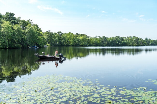 A local fisherman tries his luck on a quiet morning at Mirror Lake Park.