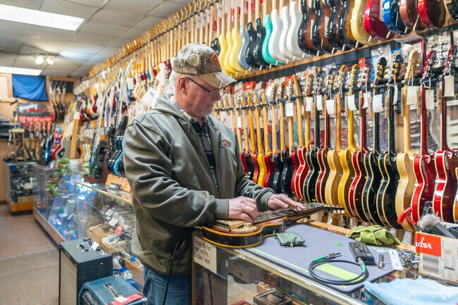 The Music Shoppe along 25th St is near Sugar Grove-Indian Acres with a large guitar selection.