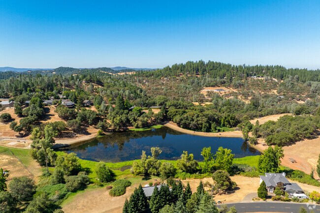 Indian Bow Lake sits at the center of Auburn Lake Trails community.