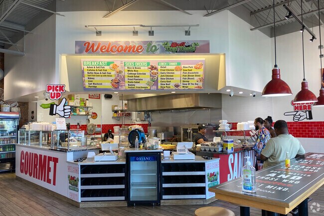 Top Taste Jamaican, near Spencer Lakes, serves jerk chicken and curry goat.