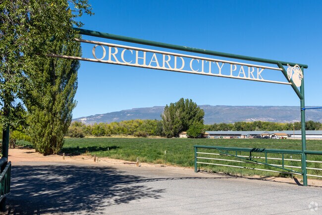 Residents frequent Orchard City Park for its wide open space and walking trail.