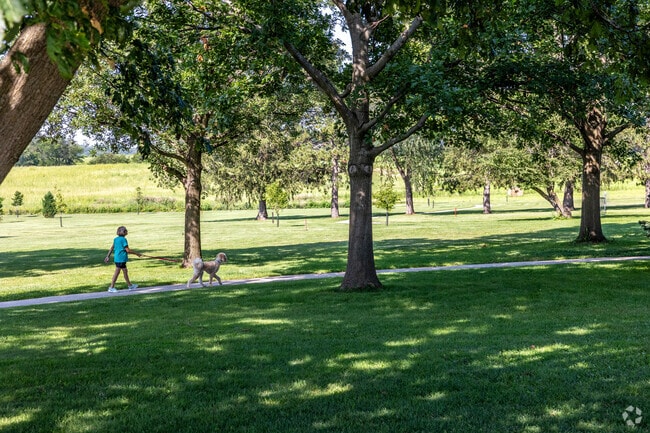 Residents enjoy walking the scenic paths of Wetherby Park and neighborhood sidewalks.