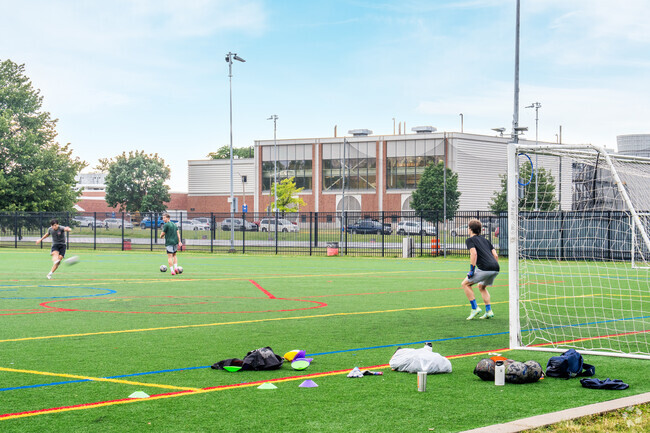 Students practice their kicking in Campustown.