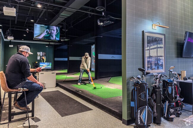 X-Golf in Apple Valley has several stations for playing virtual golf near Old Town.