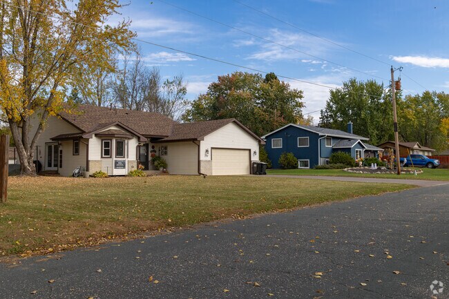 Midcentury homes in East Bethel offer privacy, mature trees, and classic design.