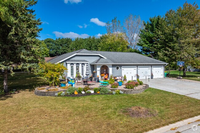 Bright colors and landscaping decorate this ranch in Baird Creek.