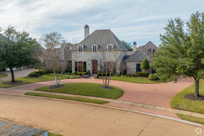 Trees line the sidewalks of several residences in Brownlee-Honore.