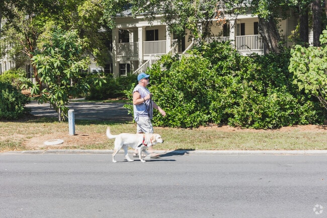 Pawleys Plantation residents enjoy walking their dog in the neighborhood in Pawleys Island.