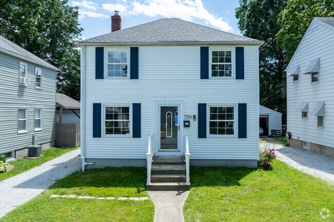 This Four Square Colonial style home is common in the Mud Brook neighborhood.