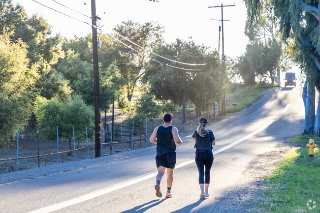 Residents enjoy a run on the quiet neighborhood streets of Crest.