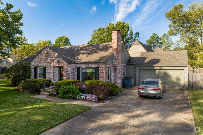 This Midtown home has beautiful red brick accents.