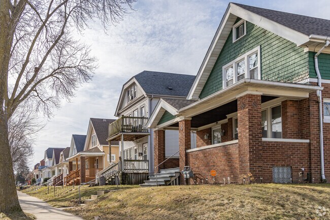 A diverse row of homes in the Forest Home Hills neighborhood.