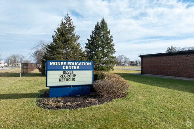 Monee Education Center has baseball diamonds with scoreboards and a concession stand.