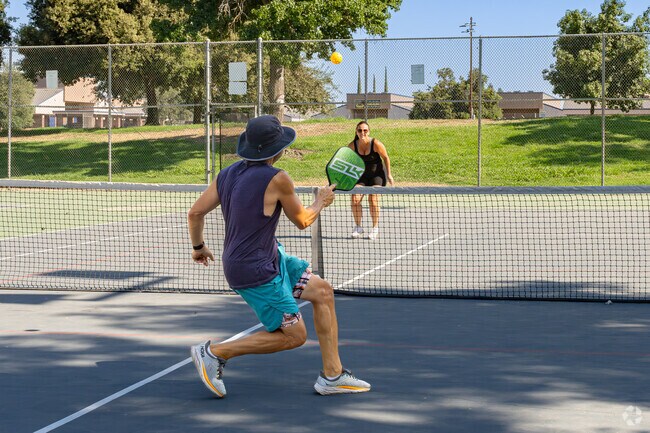 A Tulare Southeast couple sharpen their pickleball skills at the local court.