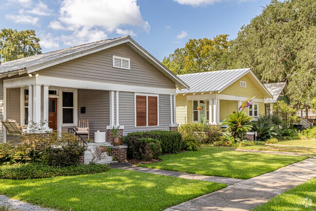Garden District residents sit on the front porch and talk to the neighbors.