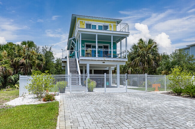 Some homes in Indian Pass are built to withstand flooding, with elevated living space.