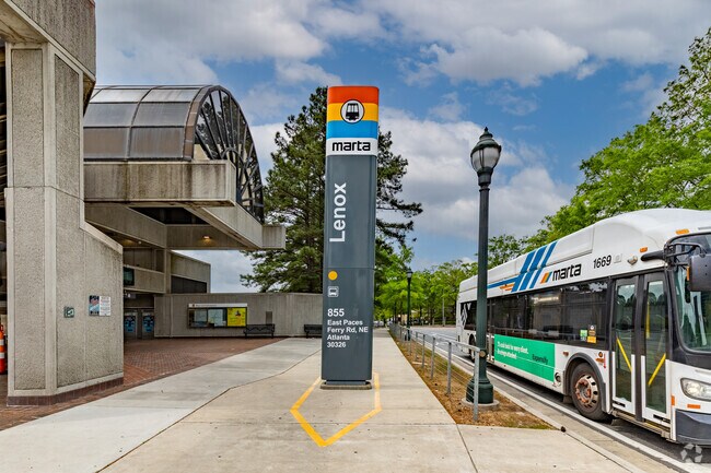 The Marta light rail line forms the northern boundary of the Pine Hills neighborhood.