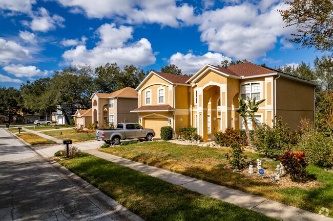 Many Prairie Lake homes have large arches framing their entryway.