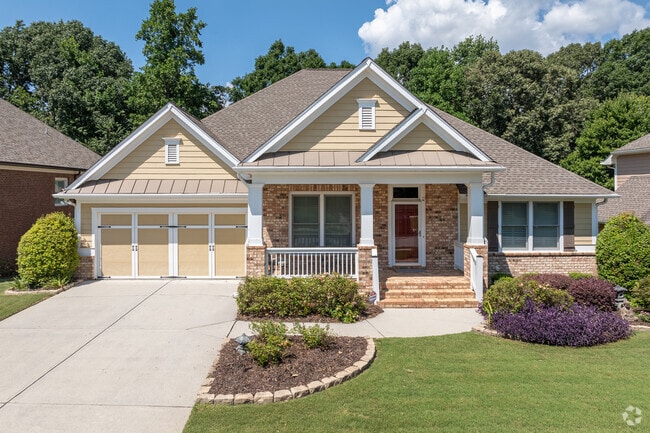 Beautiful craftsman on well maintain lawns are seen throughout Sterling on the Lake.
