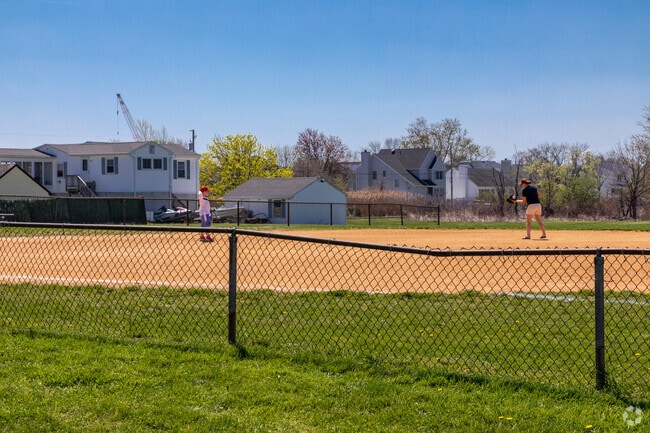 The Bayshore Park activities center provides a great place to play ball with the kids.