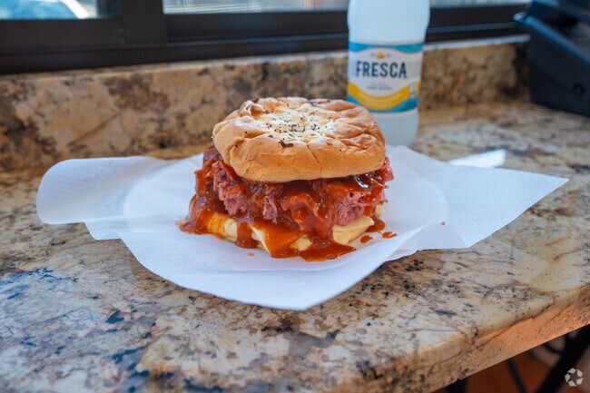 Order the famous three-way roast beef sandwich from Atha's in Lower Broadway.