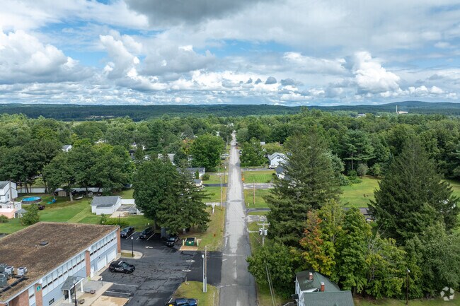 A multitude of housing styles line the peaceful streets of Boscawen.