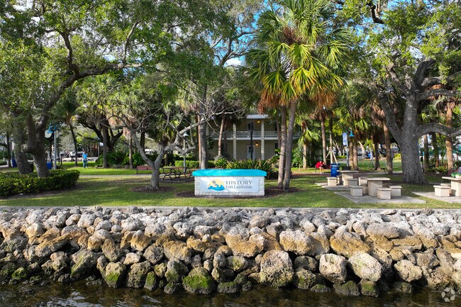 Riverwalk with historical signage.