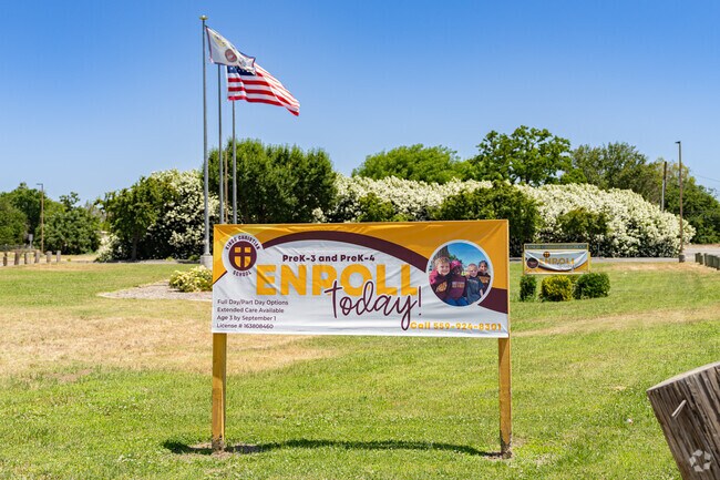 A large sign outside the entrance to Kings Christian School encourages students to enroll.