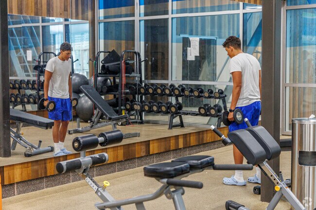 Focus on your form in the fitness center at Cahill Recreation Center.