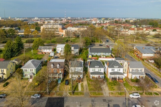 Residents admire the historic charm of American Foursquare homes in Virginia Union.
