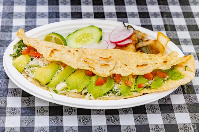 The Patrona Tacos food truck serves a Super Quesadilla.