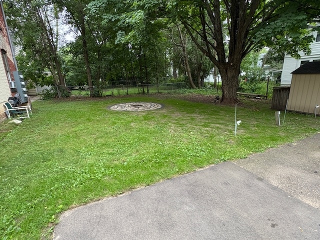 New landscaped backyard with fire pit