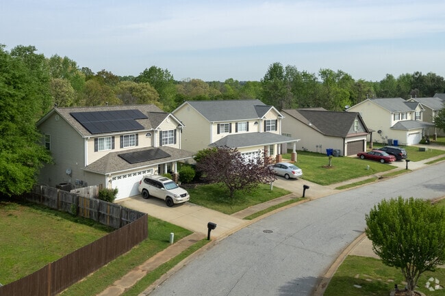 Large 2-story homes with small front yards can be found inside Wadsworth Hills.
