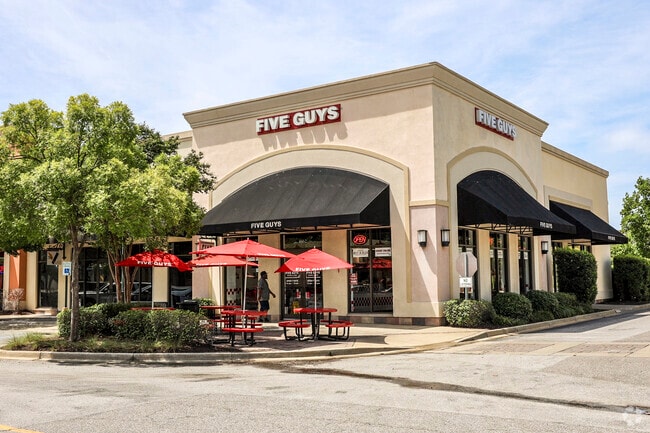 Five Guys restaurant at The Village offers outdoor seating for warm days.