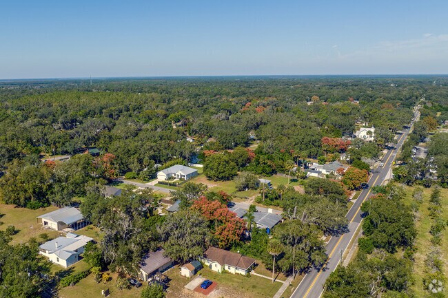 Geneva's mature tree canopies provide privacy and security between neighboring properties.