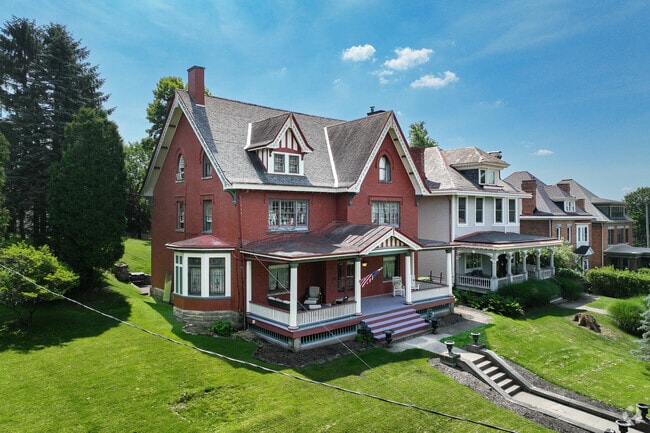 The gothic revival in Perry North have bargeboards and pointed arches.