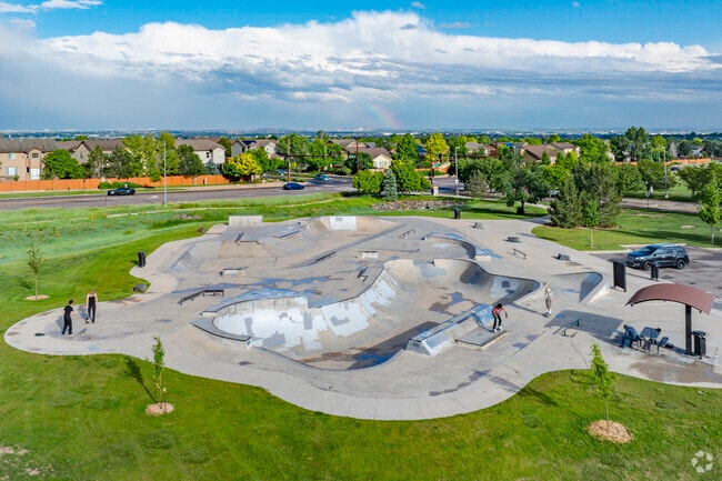 Concrete waves roll under the wheels of skaters at Trail Winds Skate Park, where each grind and flip becomes a dance with gravity. Here, in this urban playground, every carve is a testament to boldness and the pursuit of balance.