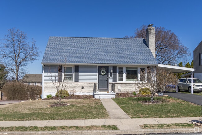 You can find a Cape Cod style home with a private driveway in Flying Hills.