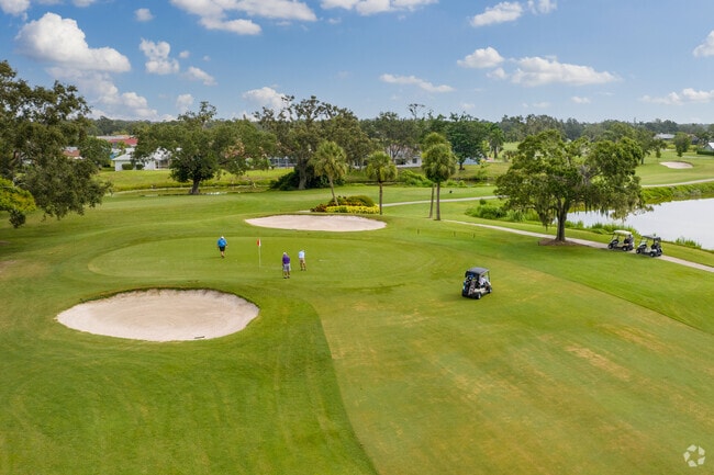 Venice Gardens residents out enjoying a round of golf at Jacaranda West Golf Club.