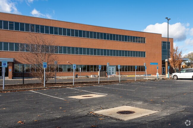 A wide view of the main entrance to AF Iluminar Middle School in Providence.
