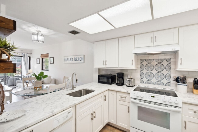 600 Neapolitan Way unit FL1-ID1073539P, Naples, FL 34103 - photo 4