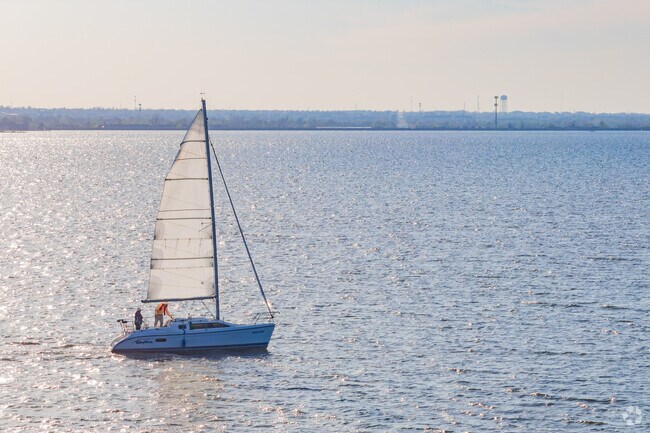 You can enjoy sailing on Lake Hefner near Britton Courtyard.
