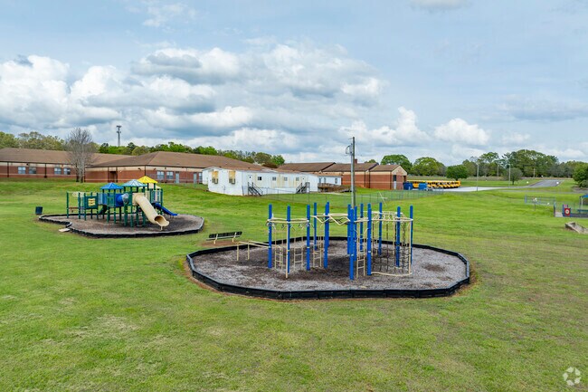 Playgrounds and green spaces are a wonderful aspect of the Township Three Elementary School.
