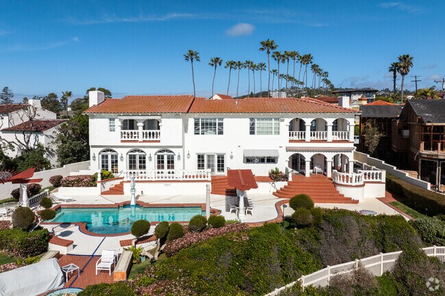 Some mansions in have epic backyards with resort like pools.