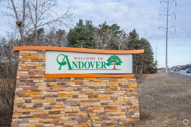 A sign welcomes people to Andover from the main road.