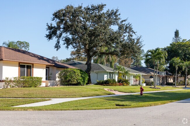 Single family homes have large yards and gardens in Paddock Park.
